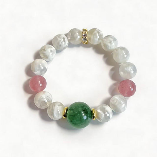 Strawberry quartz bracelet with a green focal bead, pink accents, and white snow phantom quartz beads